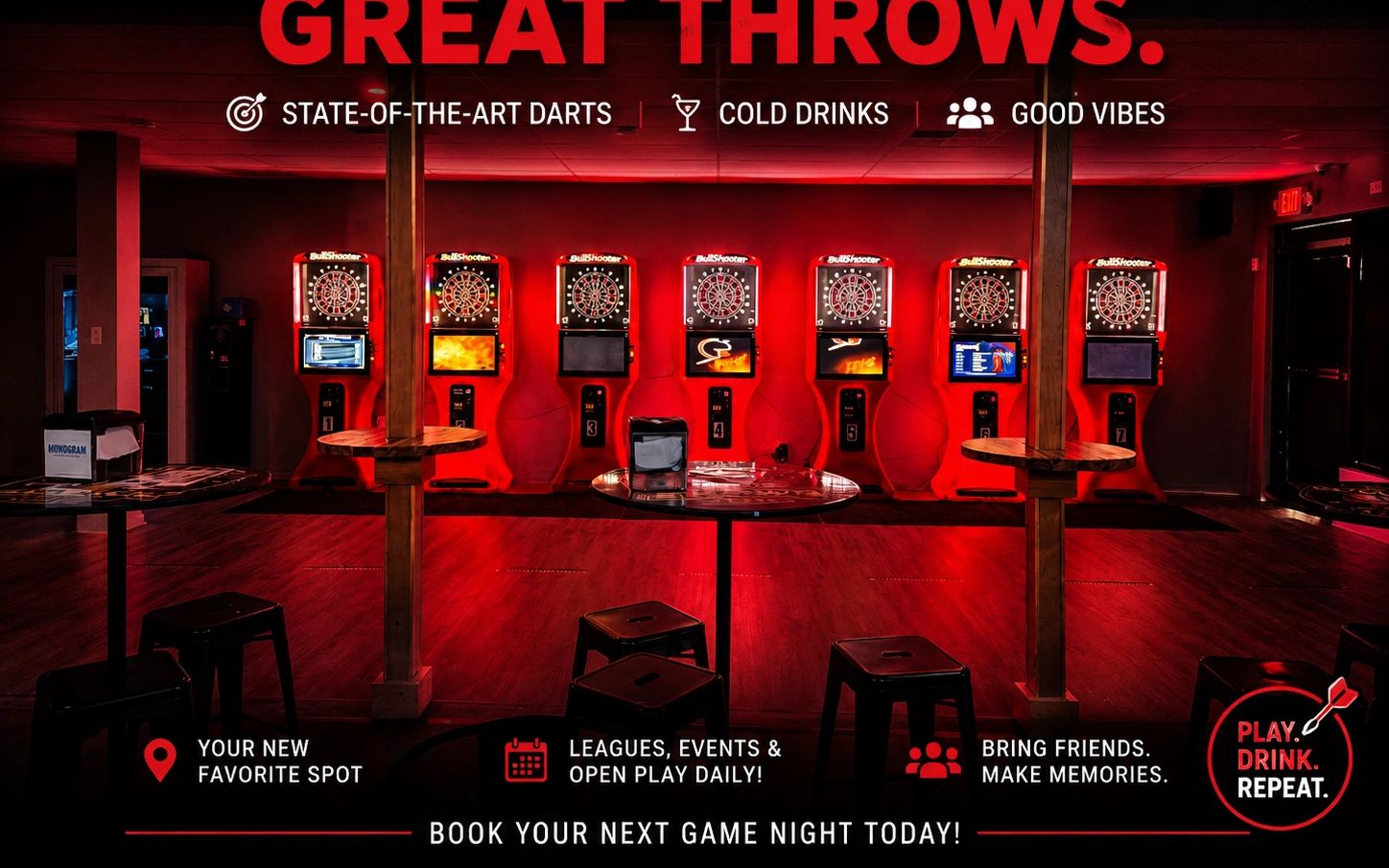 Row of illuminated Bullshooter electronic dart boards in a red-lit room